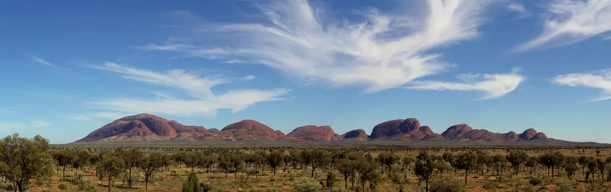 Kata Tjuta on the horizon across the desert